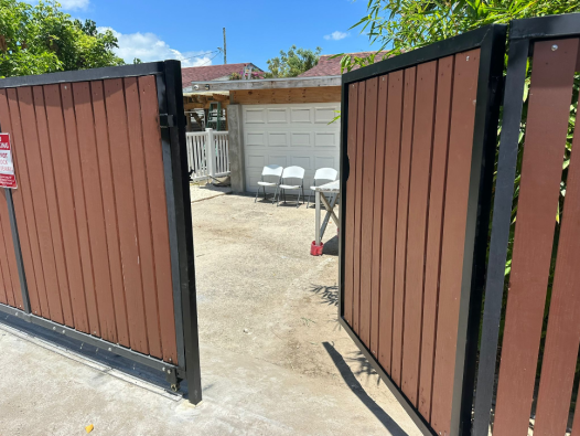 Walk-in Gate on an Existing Sliding Gate at Columbus Close, Walkers Road, Georgetown